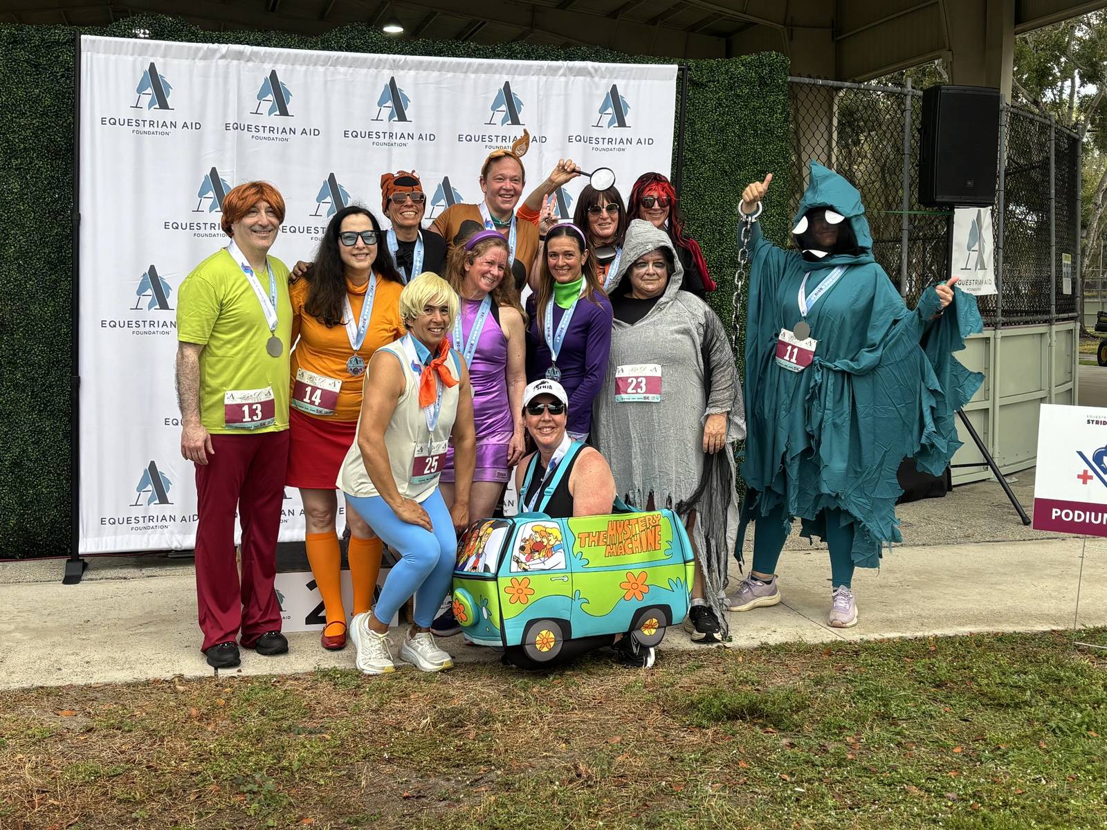 Equestrian Aid Foundation costume group at a community 5K fundraiser